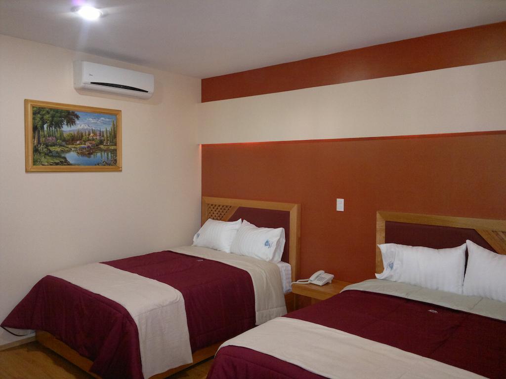 Hotel Global Express Tehuacán Habitación foto